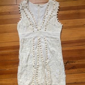 Unique white Pom Pom dress! Size small. Worn once